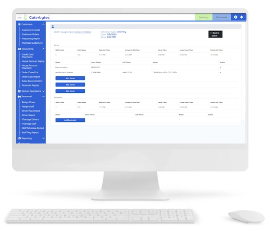 A digital screenshot of a white desktop monitor displays the Caterbytes staff management interface. The screen shows a Staff Assignment table for Order #115857, organized into sections for Server and Bartender roles. The table includes columns for punch-in times, arrival times, and leave event times, with blue buttons to "Add Server" or "Add Bartender." A blue navigation sidebar is visible on the left, and a white keyboard and mouse sit in the foreground.
